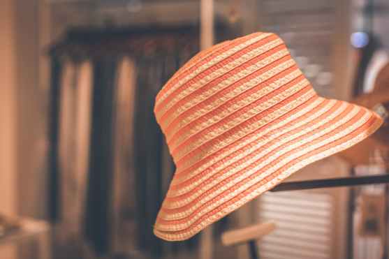 selective focus photography of orange hat